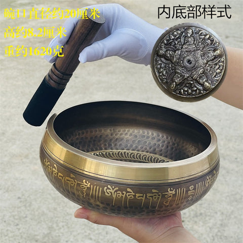 Bol de méditation en cuivre fait main au Népal avec pilon vajra et son de Bouddha m3331263 