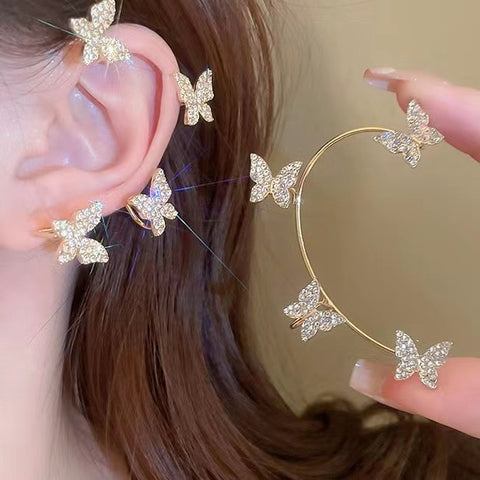 Boucles d'oreilles papillon légères et luxueuses, avec un design haut de gamme intégré m3331087
