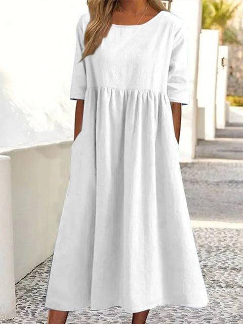 New cotton and linen casual short-sleeved pocket pleated loose round neck dress m300890