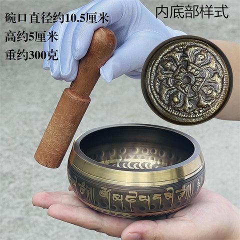 Bol de méditation en cuivre fait main au Népal avec pilon vajra et son de Bouddha m3331263 