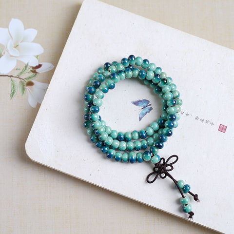 Jouez avec trois cercles et empilez 108 perles Bracelet en céramique Jingdezhen Bracelet de style ethnique m3331303 