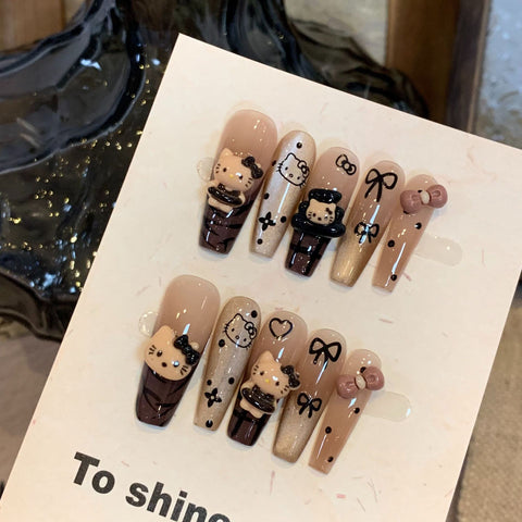 Faux ongles amovibles en forme d'œil de chat Hello Kitty marron de qualité supérieure, longs et blancs, avec autocollant m3331216