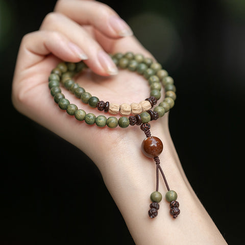 Bracelet de perles de Bouddha à double cercle en bois de santal vert, bracelet en bois de santal vert, bracelet en graines de passion m3331262. 
