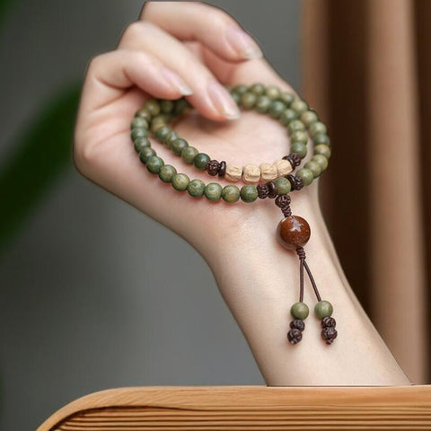 Bracelet de perles de Bouddha à double cercle en bois de santal vert, bracelet en bois de santal vert, bracelet en graines de passion m3331262. 
