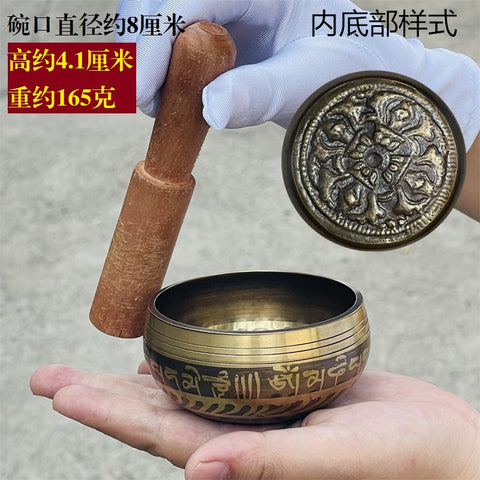 Bol de méditation en cuivre fait main au Népal avec pilon vajra et son de Bouddha m3331263 