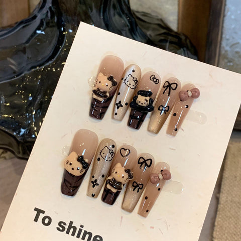 Faux ongles amovibles en forme d'œil de chat Hello Kitty marron de qualité supérieure, longs et blancs, avec autocollant m3331216