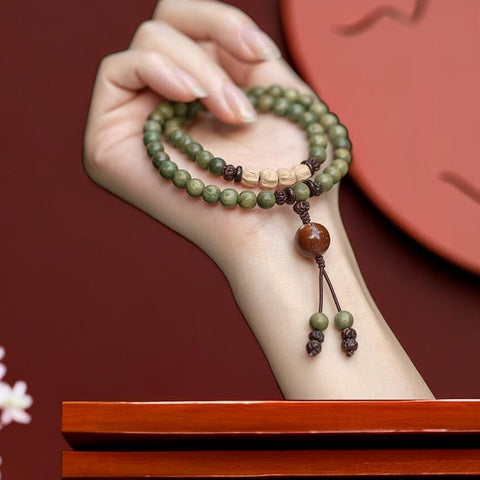 Bracelet de perles de Bouddha à double cercle en bois de santal vert, bracelet en bois de santal vert, bracelet en graines de passion m3331262. 
