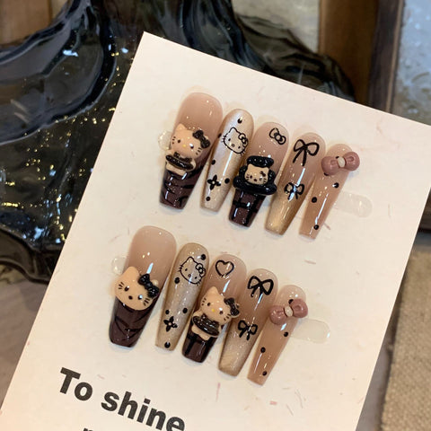 Faux ongles amovibles en forme d'œil de chat Hello Kitty marron de qualité supérieure, longs et blancs, avec autocollant m3331216